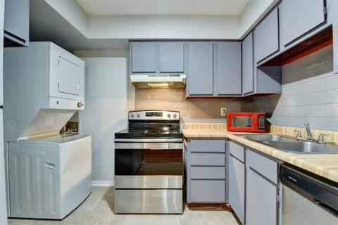 Photo of 9350 Country Creek Drive #50, Houston, TX 77036 (MLS # 91806553)