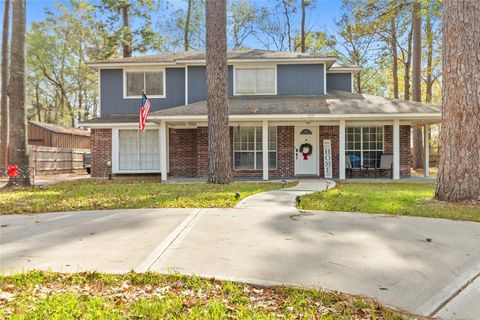 Photo of 117 E Park Drive, Conroe, TX 77356 (MLS # 11519890)