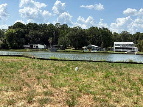 Photo of 13264 Lake Conroe Bay Road, Willis, TX 77318 (MLS # 13780423)