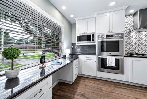 Photo of 6030 Warm Springs Road, Houston, TX 77035 (MLS # 57623438)