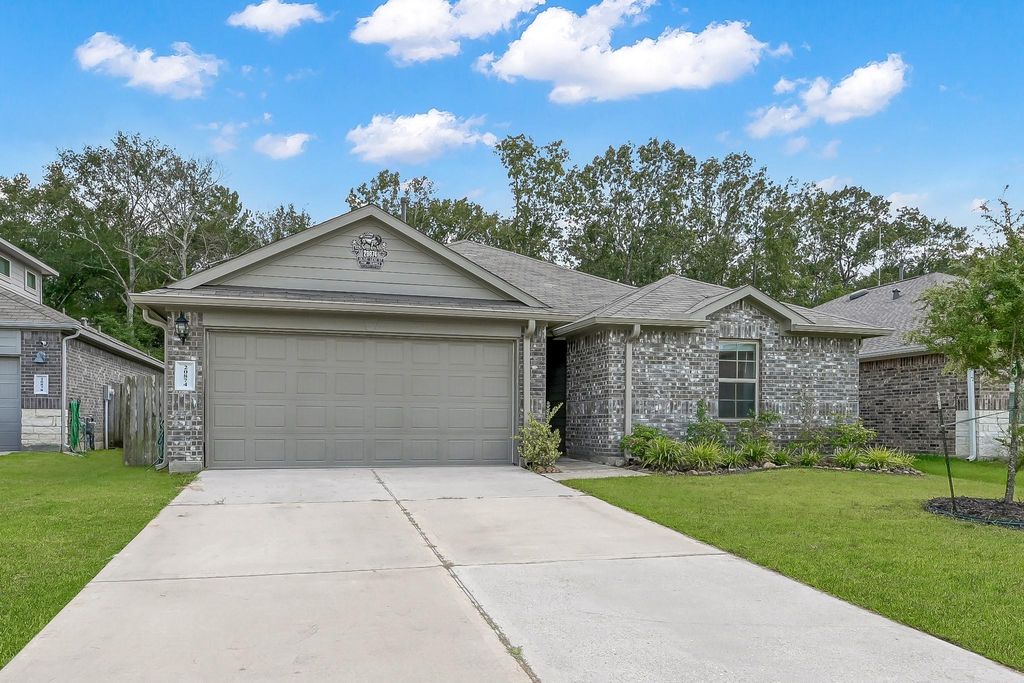 Photo of 20874 Olive Leaf Street, New Caney, TX 77357 (MLS # 67916404)
