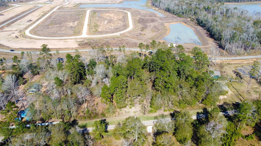 Photo of 1928 County Road 3434 N, Cleveland, TX 77327 (MLS # 59237801)