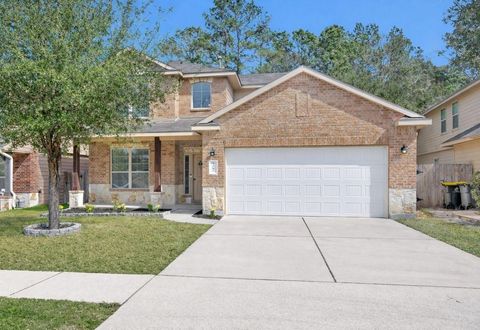 Photo of 9587 E Woodmark, Conroe, TX 77304 (MLS # 29971394)