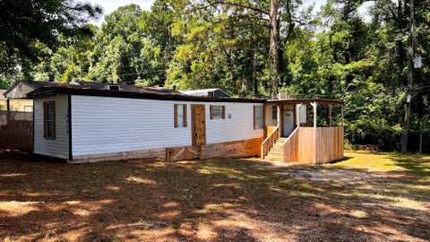 Photo of 14419 W Lee Shore Drive, Willis, TX 77318 (MLS # 25226554)