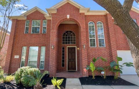 Photo of 10115 Cottonwood Canyon Drive, Houston, TX 77095 (MLS # 87737756)