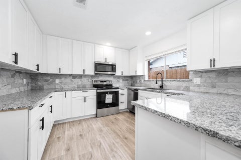 Photo of 10402 Rancho Bernardo Lane, Sugar Land, TX 77498 (MLS # 61634360)