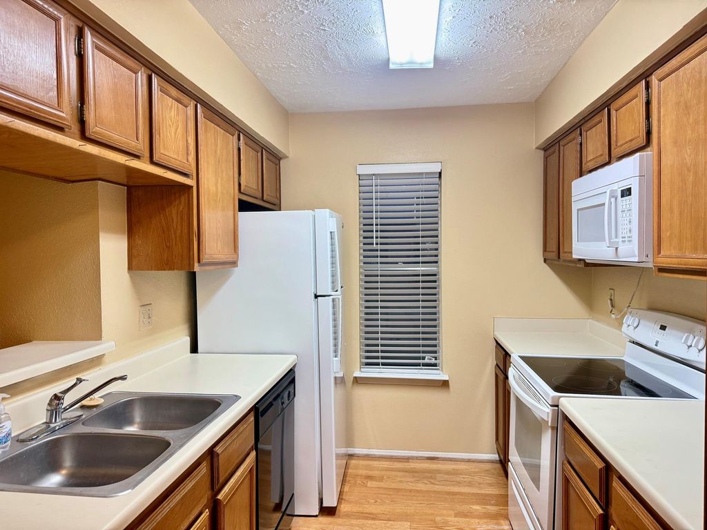 Photo of 10555 Turtlewood Court #2407, Houston, TX 77072 (MLS # 21488093)