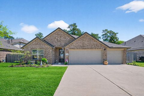 Photo of 725 Ivory Creek Court, Willis, TX 77378 (MLS # 81273784)