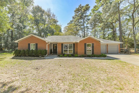 Photo of 15256 Conroe Drive, Conroe, TX 77384 (MLS # 28826590)