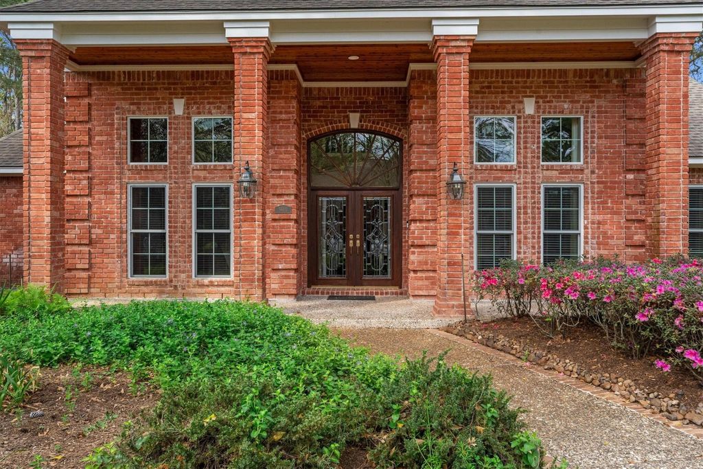 Photo of 5603 Rushing River Drive, Houston, TX 77345 (MLS # 33908529)
