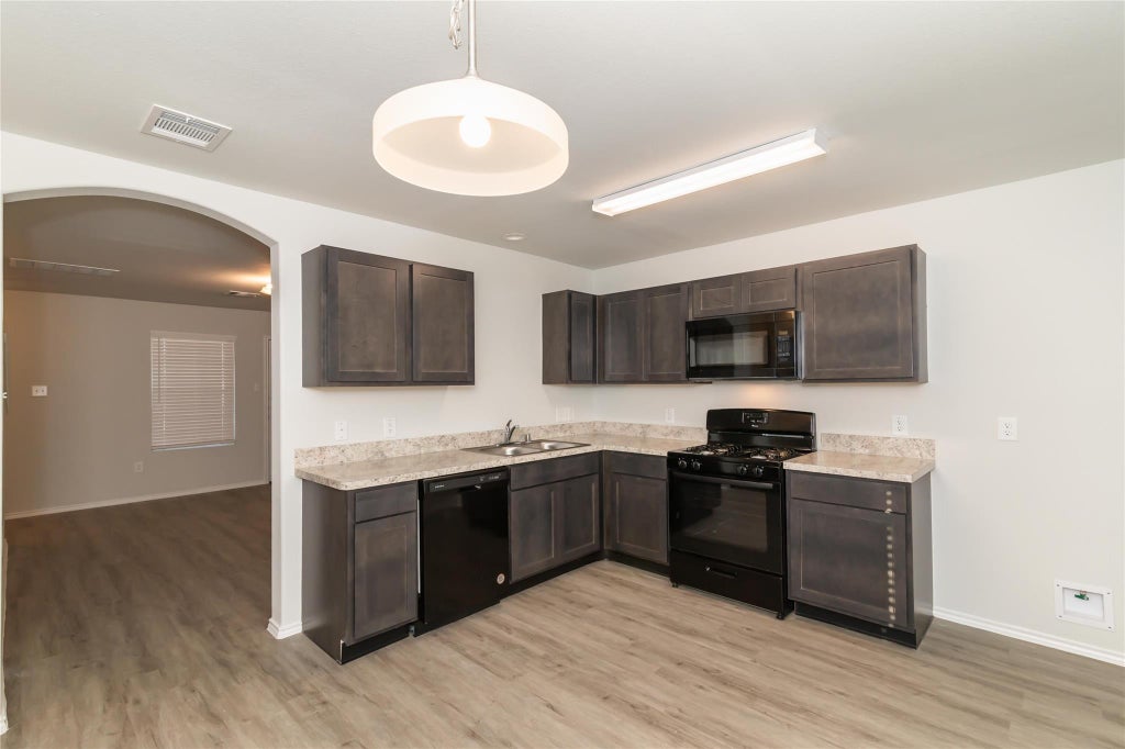 Photo of 8630 Doris Oaks Circle, Houston, TX 77028 (MLS # 10984103)