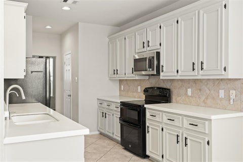 Photo of 9611 Oxford Grove Drive, Houston, TX 77095 (MLS # 62246671)