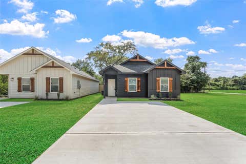 Photo of 315 N Woodson Street St, Willis, TX 77378 (MLS # 62754354)