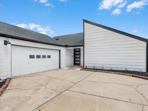 Photo of 2231 Round Lake Drive, Houston, TX 77077 (MLS # 96561824)