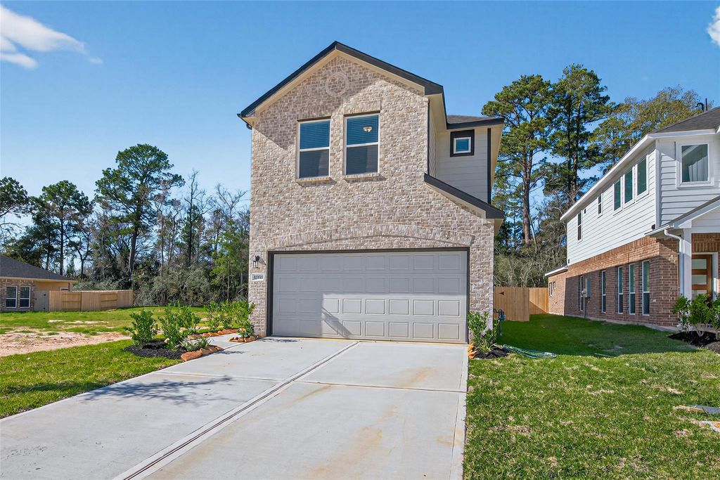 Photo of 12371 Sunset Canyon Way, Willis, TX 77318 (MLS # 98298298)