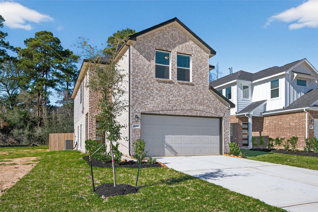 Photo of 12371 Sunset Canyon Way, Willis, TX 77318 (MLS # 98298298)