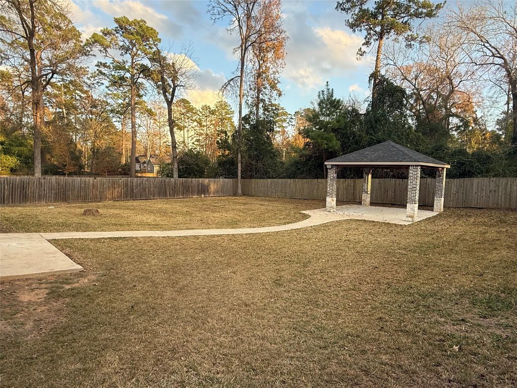 Photo of 10464 Royal York Dr, Conroe, TX 77303 (MLS # 69660683)
