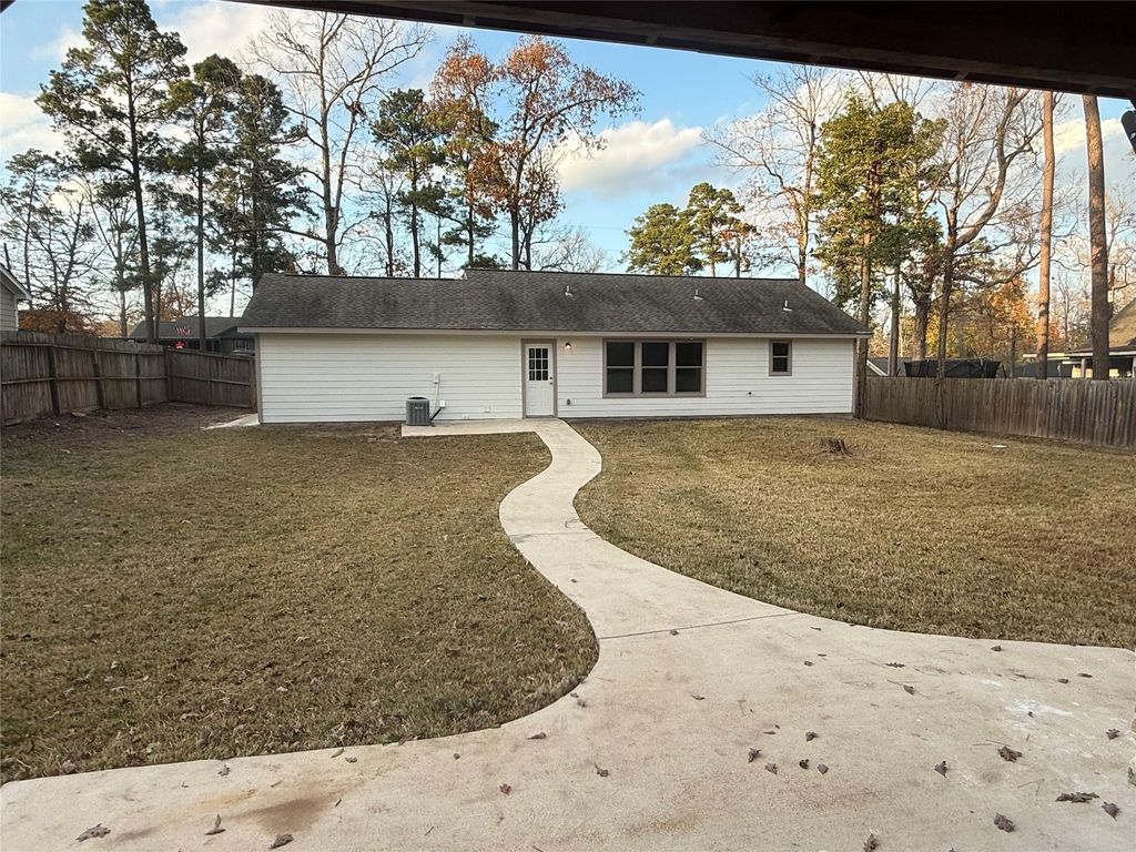 Photo of 10464 Royal York Dr, Conroe, TX 77303 (MLS # 69660683)