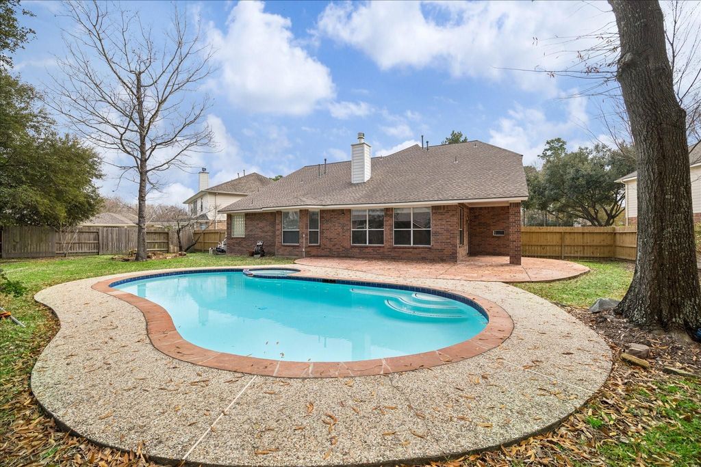 Photo of 7311 Open Oak Way, Humble, TX 77346 (MLS # 61764707)
