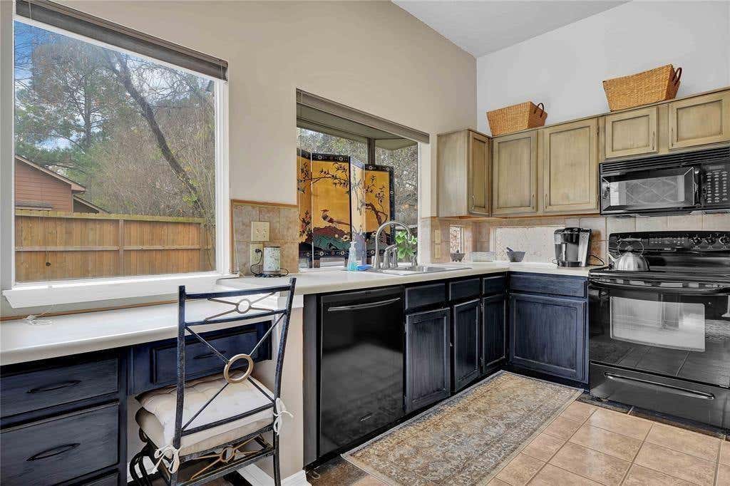 Photo of 4114 Meadowgold Lane, Houston, TX 77345 (MLS # 50972453)