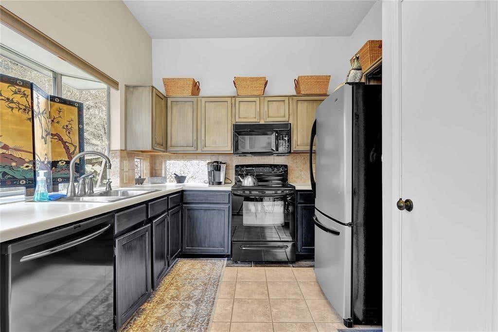 Photo of 4114 Meadowgold Lane, Houston, TX 77345 (MLS # 50972453)