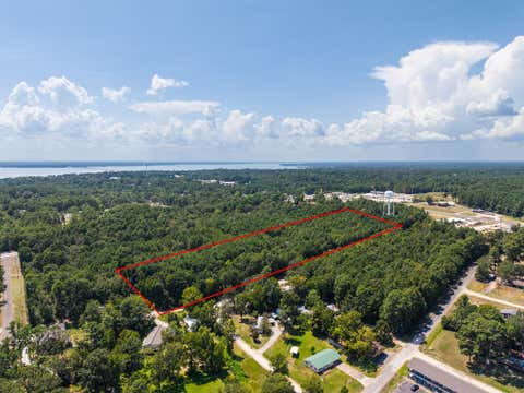 Photo of 272 Artesian, Onalaska, TX 77360 (MLS # 82120149)
