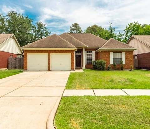 Photo of 1207 Boulderwoods Drive, Houston, TX 77062 (MLS # 10433949)