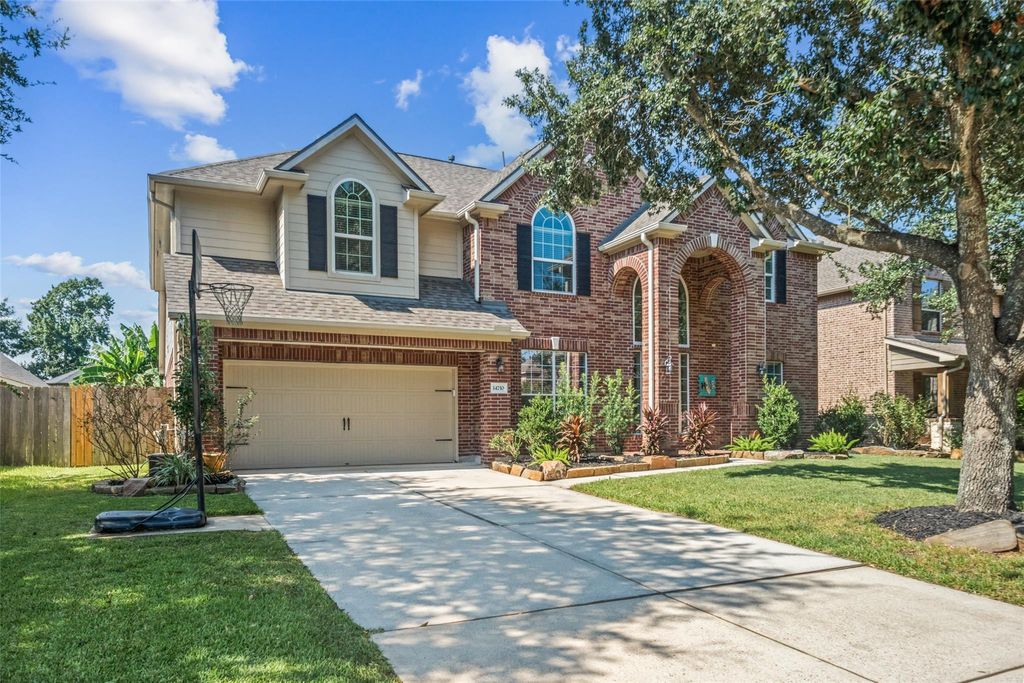 Photo of 14710 Castle Cove Lane, Houston, TX 77044 (MLS # 43173878)