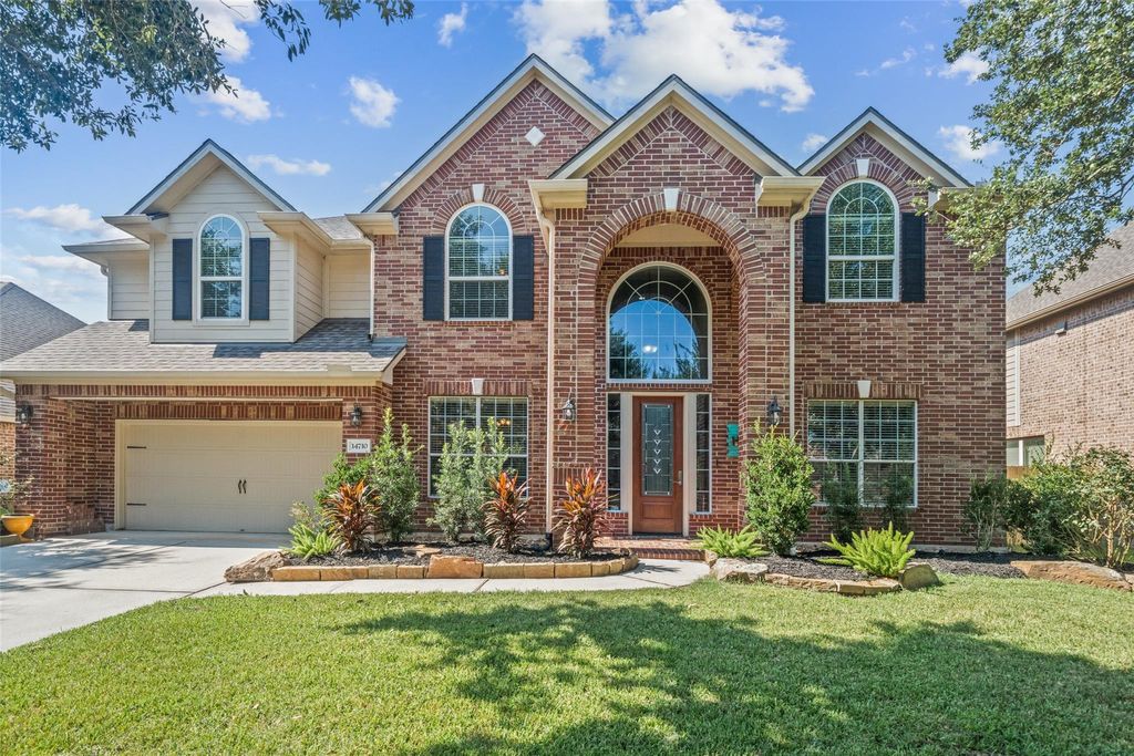 Photo of 14710 Castle Cove Lane, Houston, TX 77044 (MLS # 43173878)