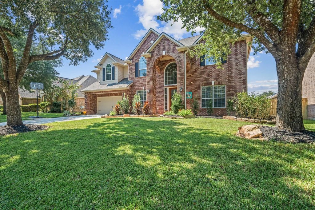 Photo of 14710 Castle Cove Lane, Houston, TX 77044 (MLS # 43173878)