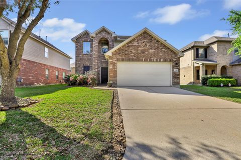Photo of 10414 Whisper Bluff Drive, Humble, TX 77396 (MLS # 45437021)