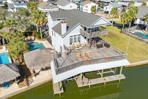 Photo of 1319 Coral Way Way, Tiki Island, TX 77554 (MLS # 30863624)