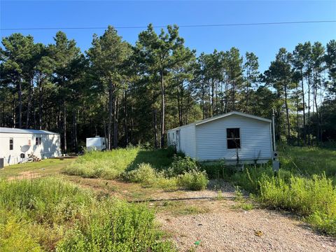 Photo of 7899 Hawthorne Lane, Plantersville, TX 77363 (MLS # 21726124)