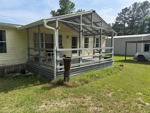 Photo of 507 Rock Creek Road, Trinity, TX 75862 (MLS # 54763974)