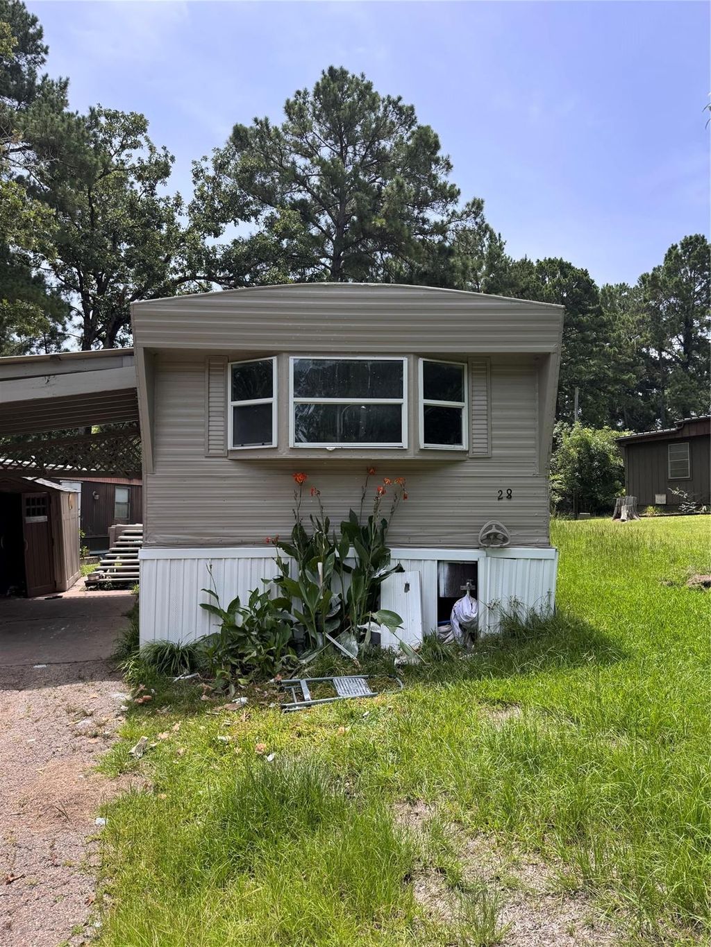 Photo of 28 E Whippoorwill Lane, Trinity, TX 75862 (MLS # 18344472)