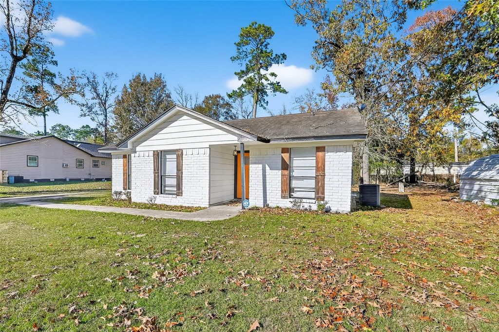 Photo of 23567 Pine Forest Drive, New Caney, TX 77357 (MLS # 89339389)