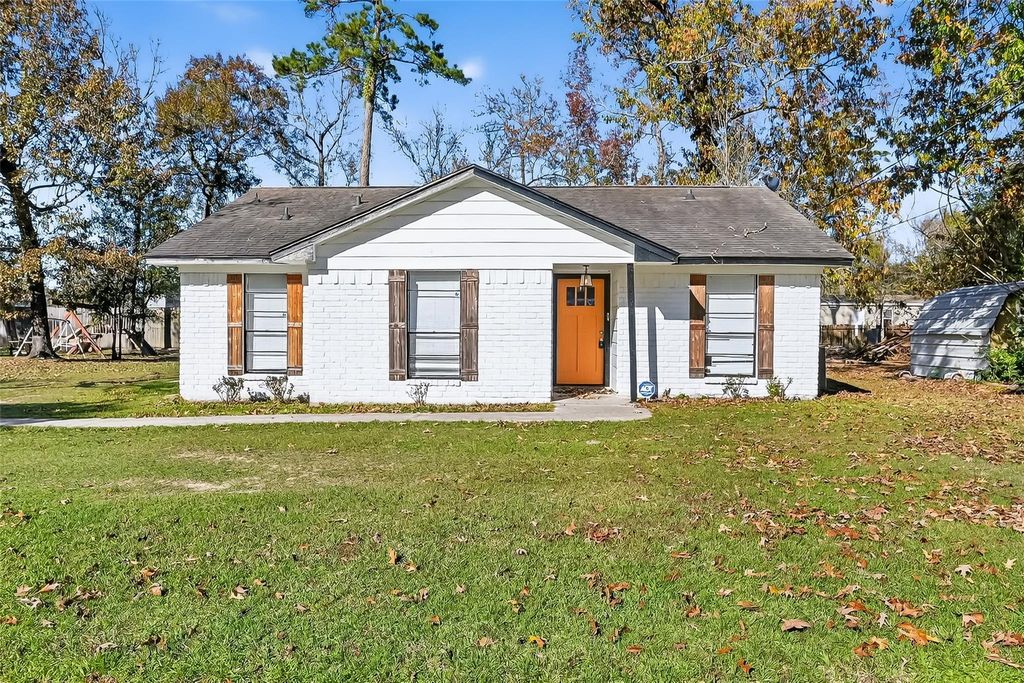 Photo of 23567 Pine Forest Drive, New Caney, TX 77357 (MLS # 89339389)