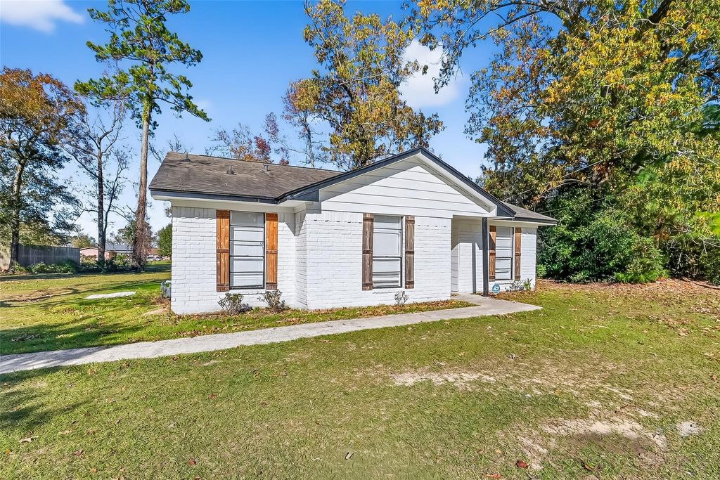 Photo of 23567 Pine Forest Drive, New Caney, TX 77357 (MLS # 89339389)