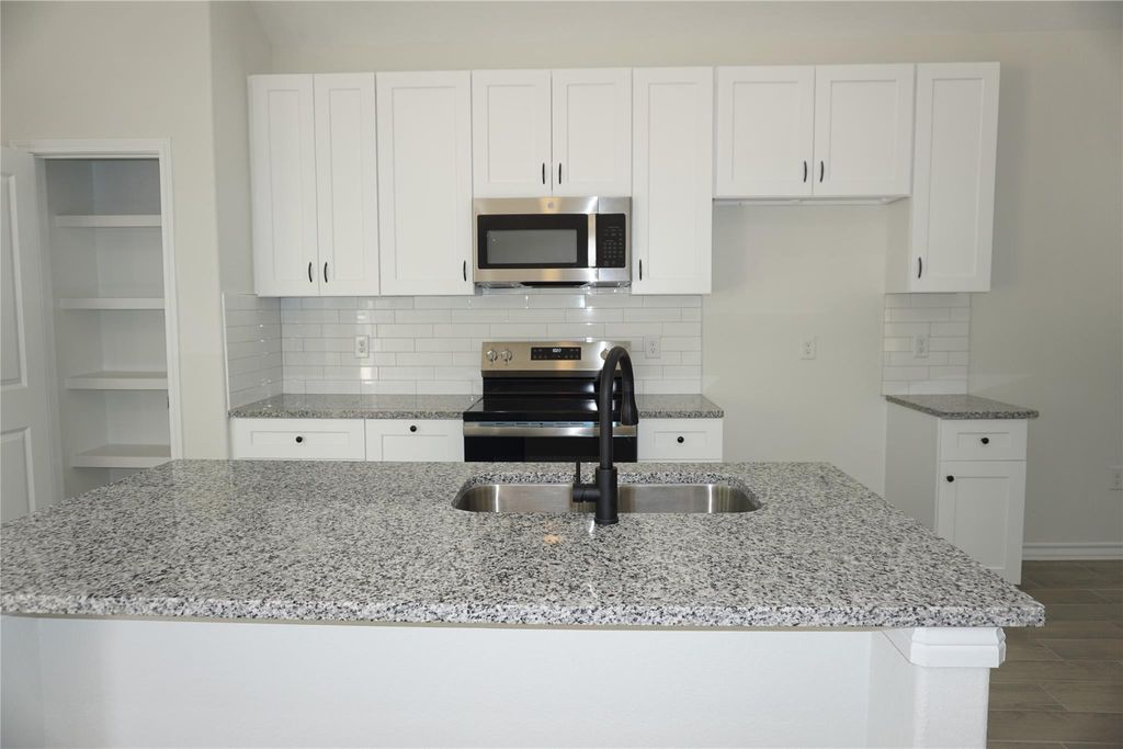 Photo of 11847 Nelwood Street, Willis, TX 77318 (MLS # 73262437)