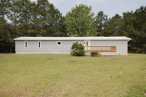 Photo of 5750 Paradise Drive, Lumberton, TX 77657 (MLS # 53916077)
