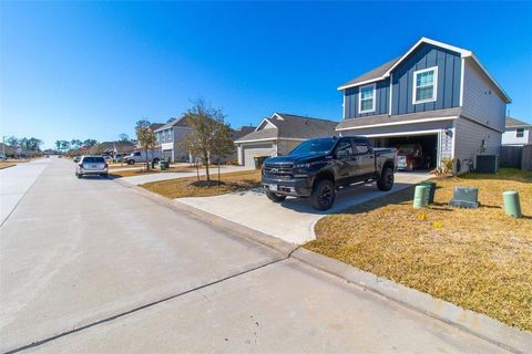 Photo of 2221 Middle Ridge Drive, Conroe, TX 77301 (MLS # 30393844)