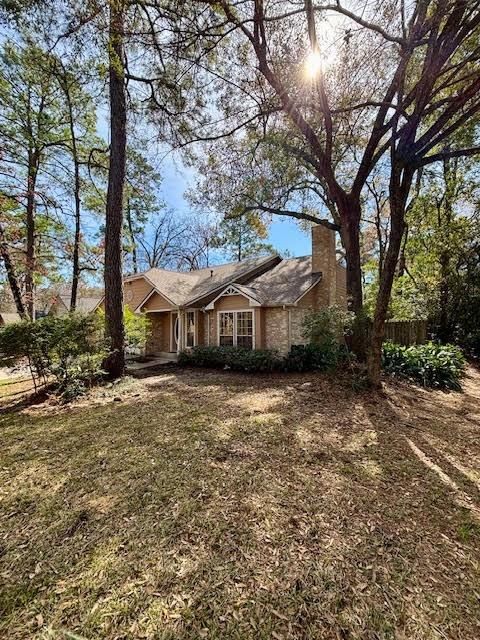 Photo of 2 Purpletop Court, The Woodlands, TX 77381 (MLS # 48066201)