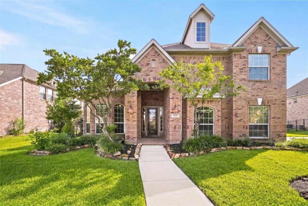Photo of 6715 W Titan Springs Drive, Spring, TX 77389 (MLS # 55878469)