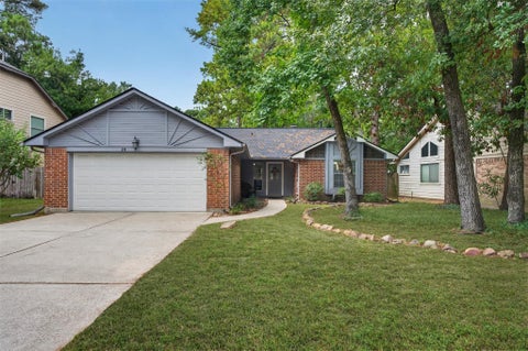 Photo of 28 S Rain Forest Court, The Woodlands, TX 77380 (MLS # 9857421)