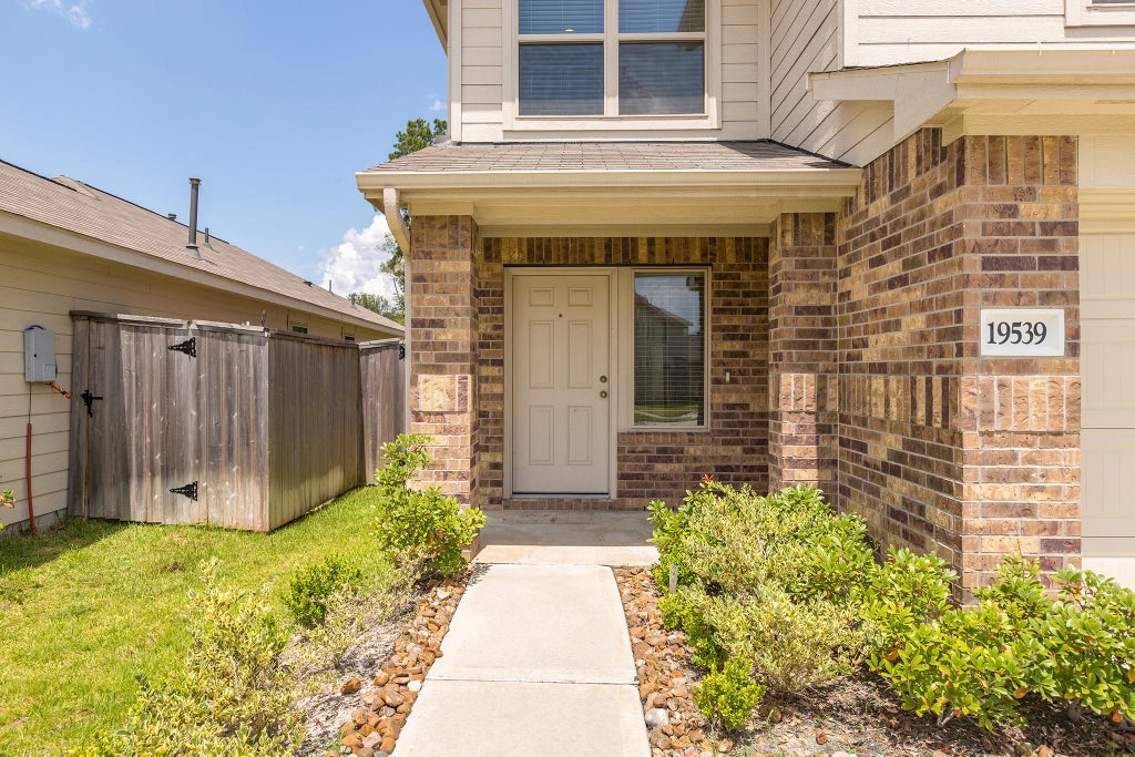 Photo of 19539 Manduca Drive, New Caney, TX 77357 (MLS # 22009399)
