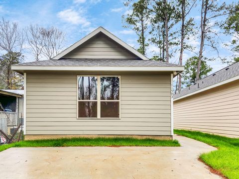 Photo of 11593 Persimmon Street, Willis, TX 77318 (MLS # 88539034)