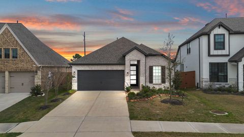 Photo of 7130 Sparrow Valley Trail, Katy, TX 77493 (MLS # 37808106)