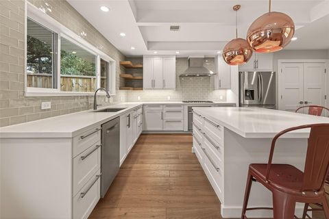 Photo of 5310 Spellman Road, Houston, TX 77096 (MLS # 52486178)