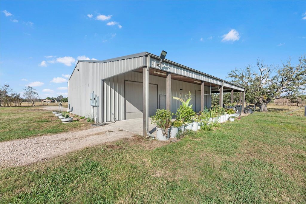 Photo of 1210 County Road 32, Angleton, TX 77515 (MLS # 62446821)