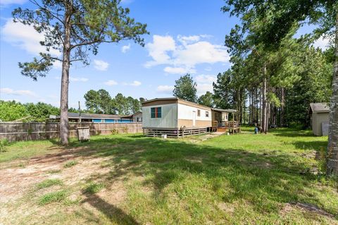Photo of 912 County Road 3479a, Cleveland, TX 77327 (MLS # 10847670)